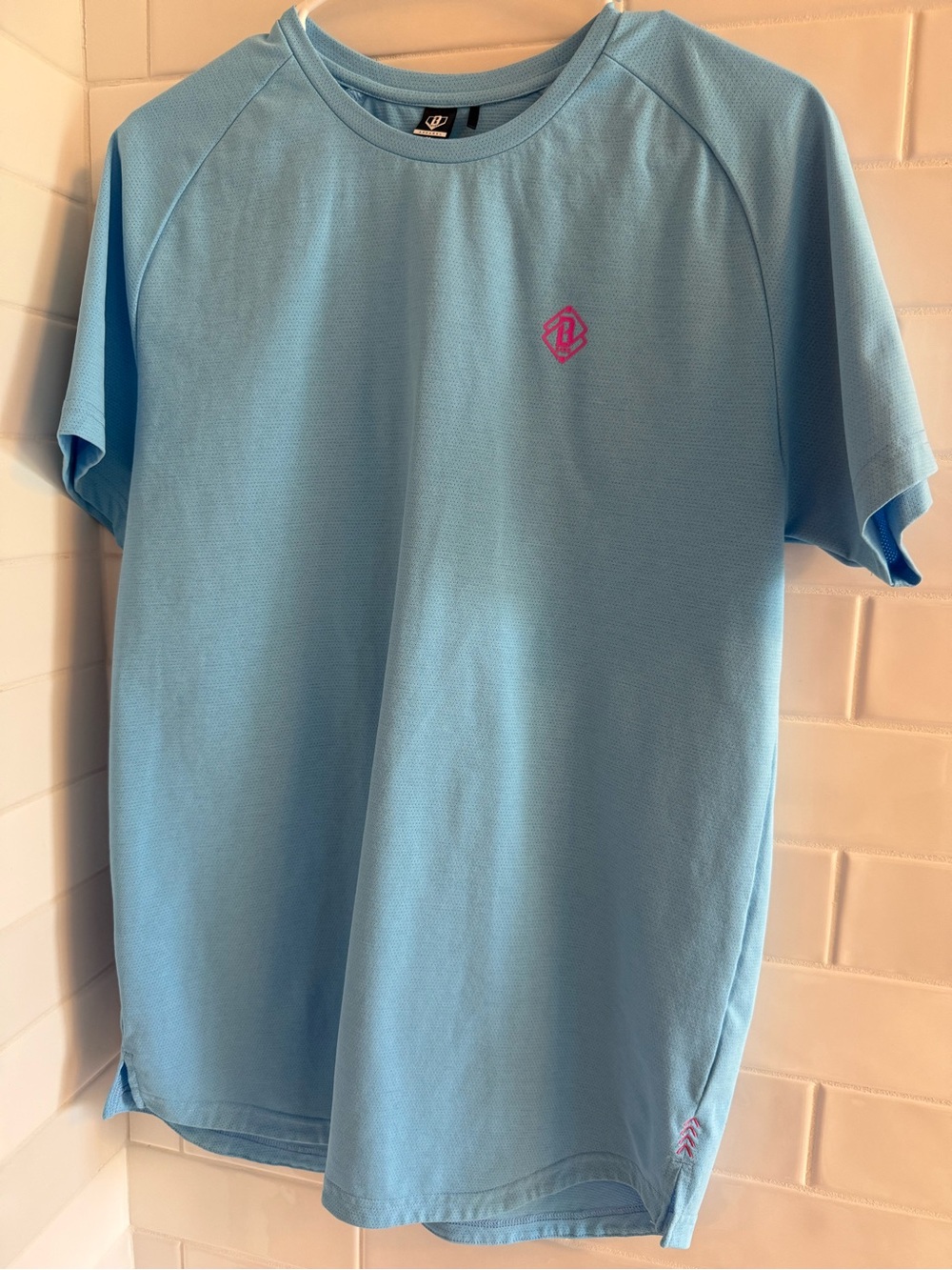 Baseball Lifestyle 101 Light Blue Short-Sleeve Performance Tee with Pink Emblem